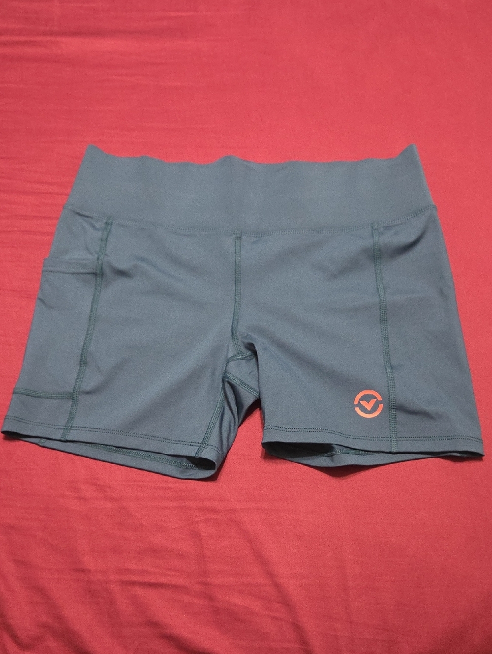 Virus Teal Bike Shorts with Coral Logo